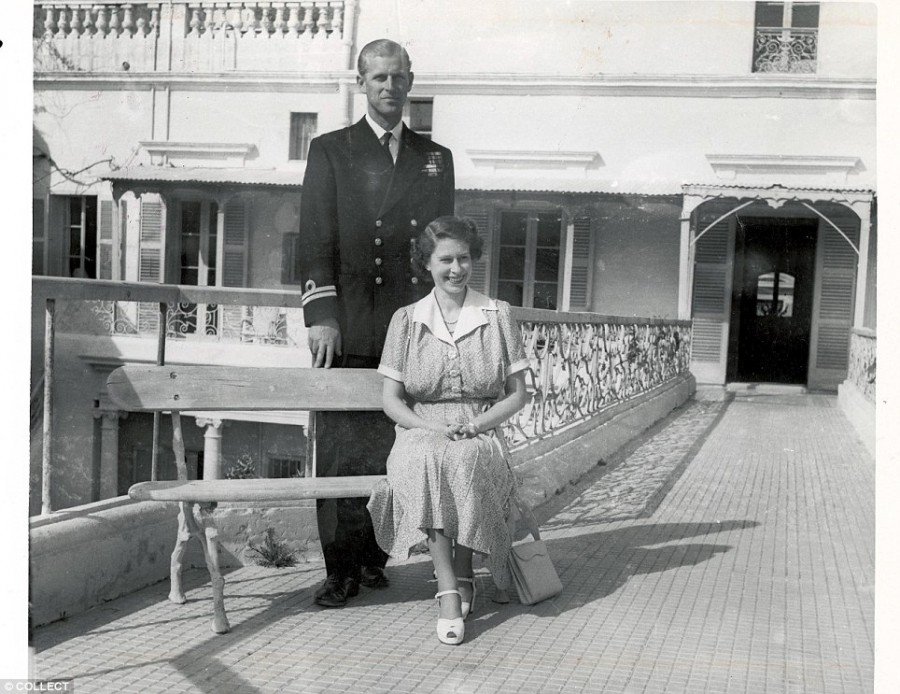 A photograph of happy couple Elizabteh and Philip on the roof of their home in Malta.